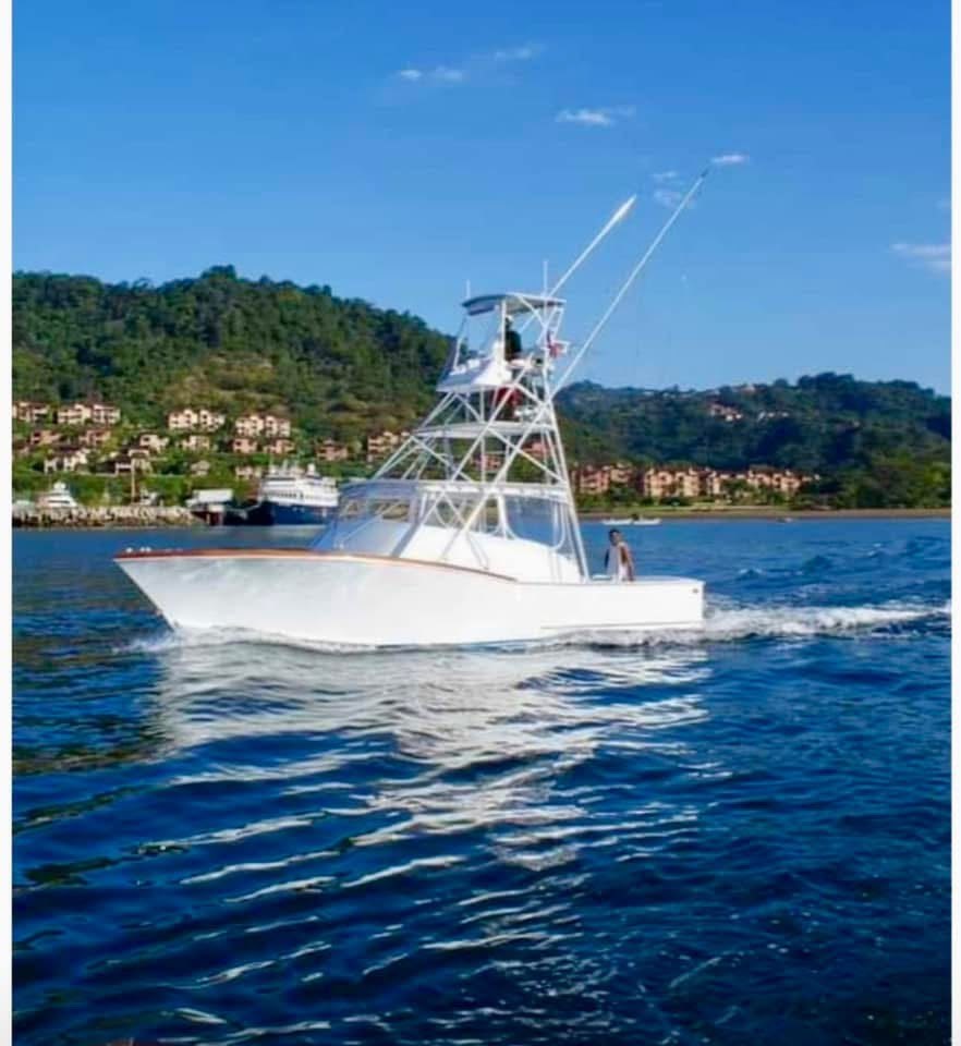 Sport fishing boat cruising along Costa Rica's Pacific coast